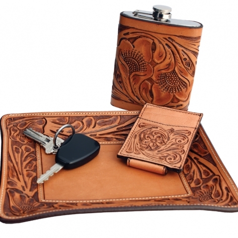Tooled leather tray and flask